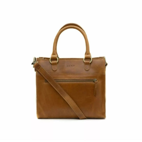 Size: 27 x 23 x 15 cm

The Bastille grab-and-go bag is a standout everyday addition to any wardrobe. It’s effortless, timeless design fits in with any style. The epitome of functionality and fashion.

Vegetable tanned leather
Unlined (RAW)
Antique Brass hardware
Inside and outsize zips & multi-functional open pockets
Top zip closure
Handle drop 12 cm
Detachable shoulder strap 98 – 108 cm