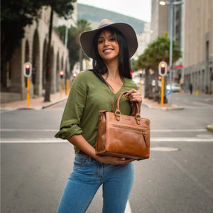 Size: 27 x 23 x 15 cm

The Bastille grab-and-go bag is a standout everyday addition to any wardrobe. It’s effortless, timeless design fits in with any style. The epitome of functionality and fashion.

Vegetable tanned leather
Unlined (RAW)
Antique Brass hardware
Inside and outsize zips &amp; multi-functional open pockets
Top zip closure
Handle drop 12 cm
Detachable shoulder strap 98 – 108 cm