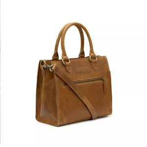 Size: 27 x 23 x 15 cm

The Bastille grab-and-go bag is a standout everyday addition to any wardrobe. It’s effortless, timeless design fits in with any style. The epitome of functionality and fashion.

Vegetable tanned leather
Unlined (RAW)
Antique Brass hardware
Inside and outsize zips &amp; multi-functional open pockets
Top zip closure
Handle drop 12 cm
Detachable shoulder strap 98 – 108 cm