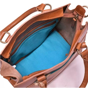 Size: 27 x 23 x 15 cm

The Bastille grab-and-go bag is a standout everyday addition to any wardrobe. It’s effortless, timeless design fits in with any style. The epitome of functionality and fashion.

Vegetable tanned leather
Unlined (RAW)
Antique Brass hardware
Inside and outsize zips &amp; multi-functional open pockets
Top zip closure
Handle drop 12 cm
Detachable shoulder strap 98 – 108 cm