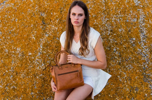 Size: 27 x 23 x 15 cm

The Bastille grab-and-go bag is a standout everyday addition to any wardrobe. It’s effortless, timeless design fits in with any style. The epitome of functionality and fashion.

Vegetable tanned leather
Unlined (RAW)
Antique Brass hardware
Inside and outsize zips &amp; multi-functional open pockets
Top zip closure
Handle drop 12 cm
Detachable shoulder strap 98 – 108 cm